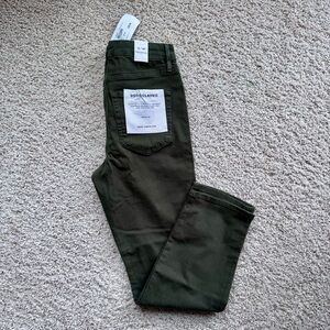 Good American Classic High Rise Jeans in Dark Green